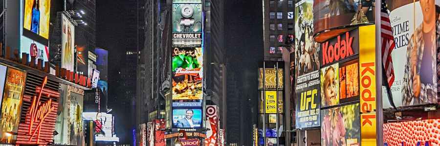 Nighttime photo of Times Square in New York