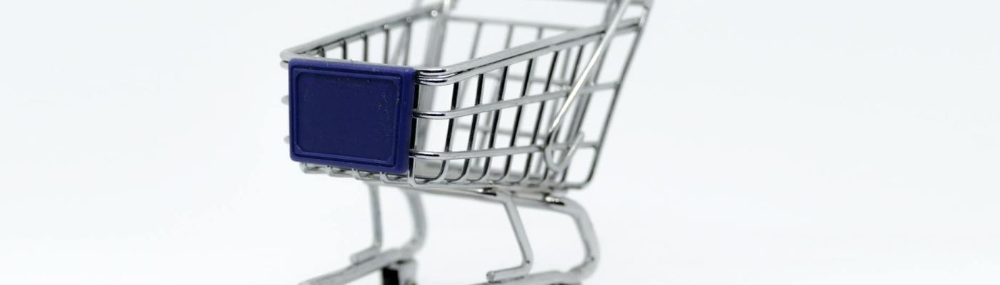 Miniature gray steel shopping cart