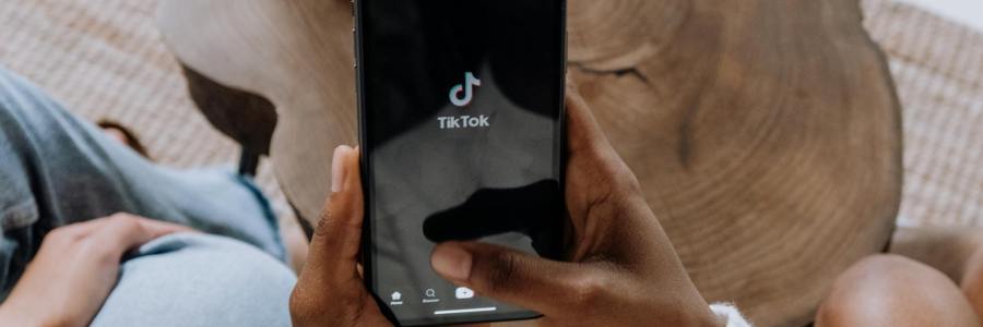 Smartphone showing social media icon for TikTok