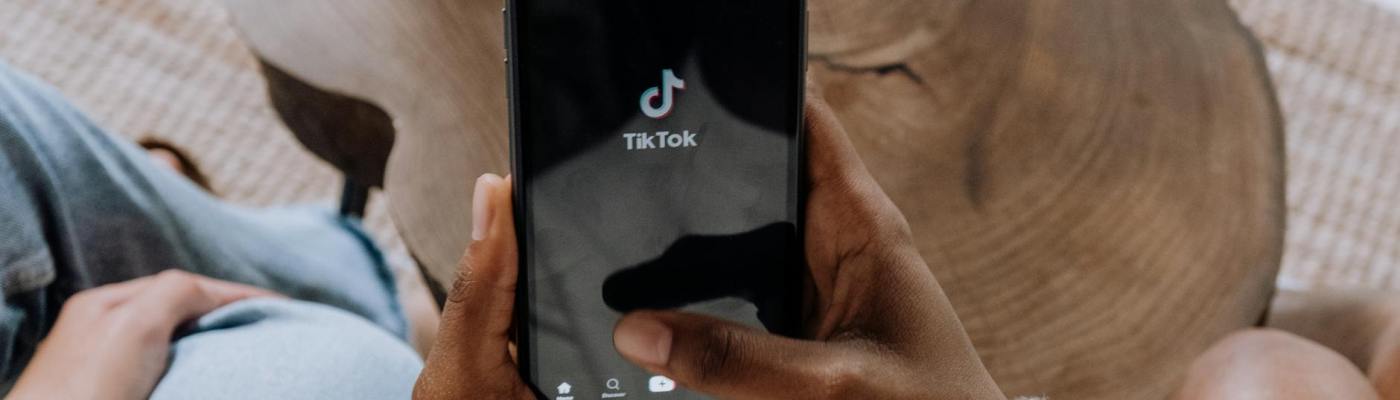 Smartphone showing social media icon for TikTok